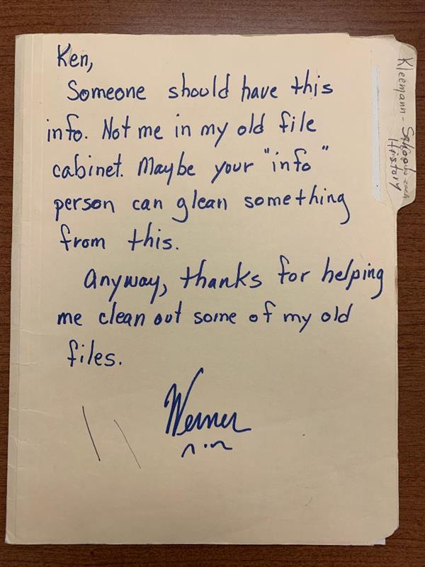 A file folder with a note from Werner to use the historical info inside